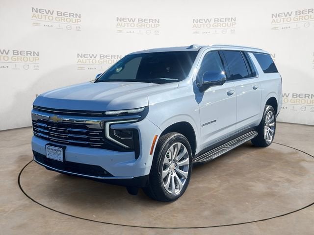 2026 Chevrolet Suburban Premier in Polar White Tricoat — front three-quarter view