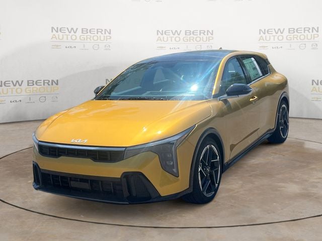 2026 Kia K4 GT-Line in Sparkling Yellow — front three-quarter view