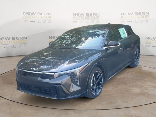 2026 Kia K4 GT-Line in Interstellar Gray — front three-quarter view