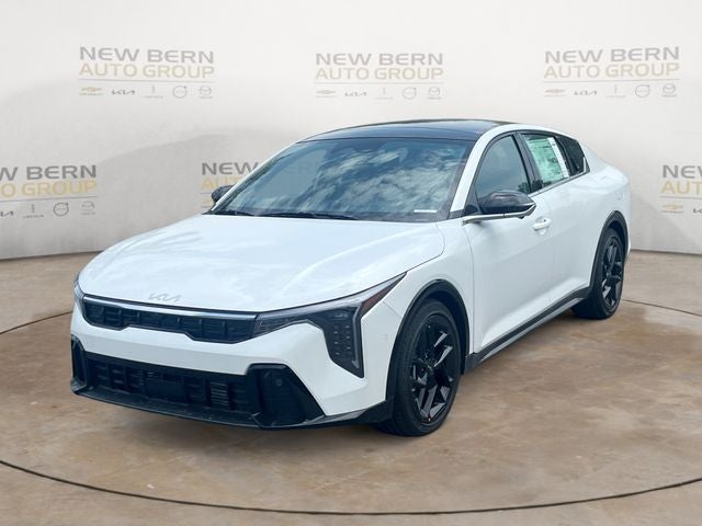 2026 Kia K4 GT-Line Turbo in Snow White Pearl — front three-quarter view