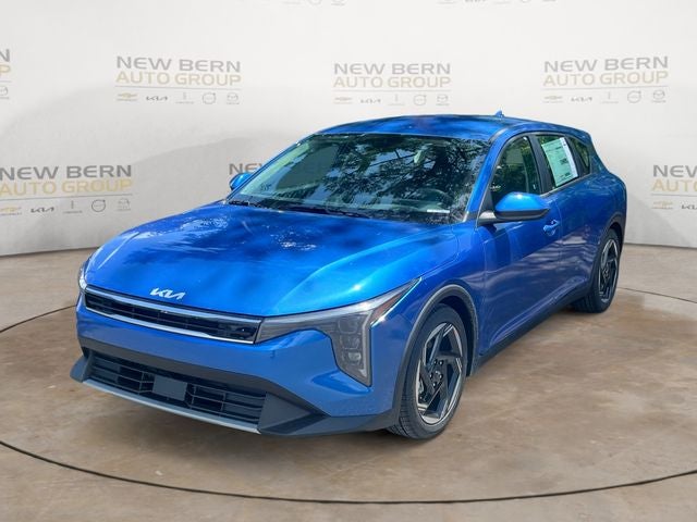 2026 Kia K4 EX in Wave Blue — front three-quarter view