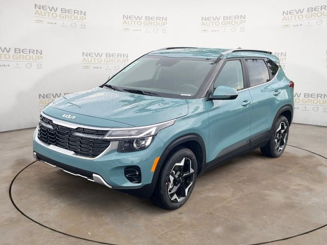 2026 Kia Seltos EX in Pluton Blue — front three-quarter view