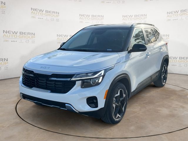 2026 Kia Seltos S in Clear White/Black Roof — front three-quarter view
