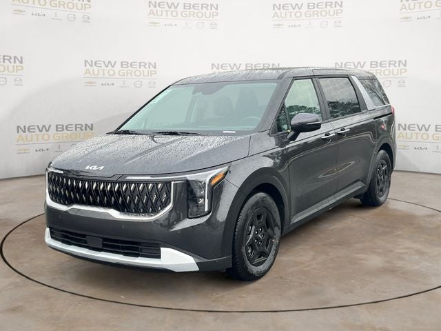 2026 Kia Carnival LXS in Panthera Metal — front three-quarter view