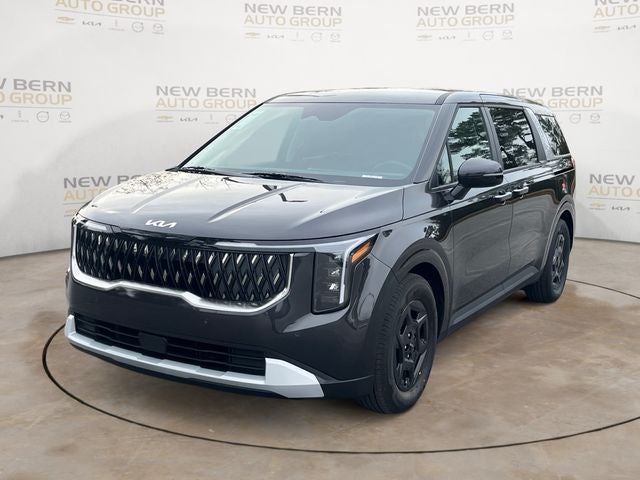 2026 Kia Carnival LXS in Panthera Metal — front three-quarter view