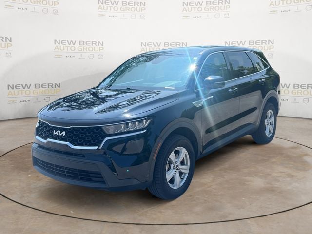 2023 Kia Sorento LX in Ebony Black — front three-quarter view