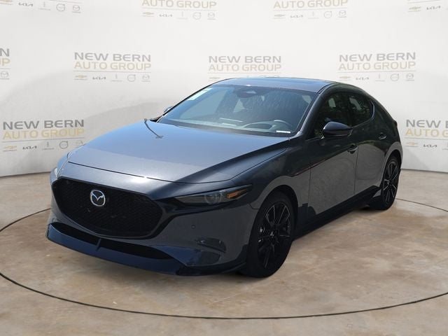 2026 Mazda Mazda3 Hatchback 2.5 Turbo Premium Plus AWD in Polymetal Gray Metallic — front three-quarter view