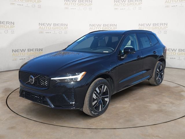 2026 Volvo XC60 Plug-In Hybrid T8 Core in Onyx Black Metallic — front three-quarter view