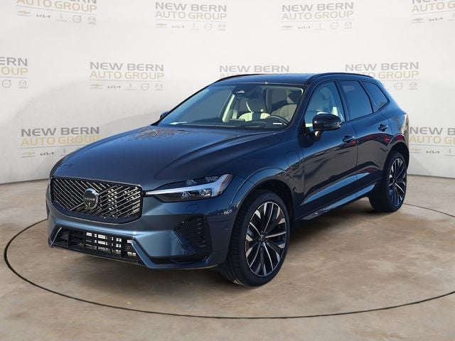 2026 Volvo XC60 Plug-In Hybrid T8 Ultra in Denim Blue Metallic — front three-quarter view