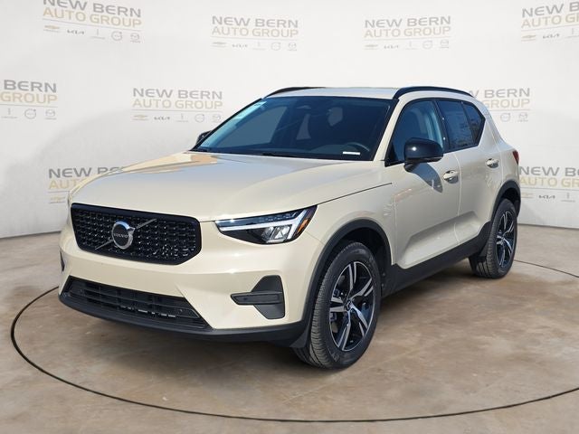 2026 Volvo XC40 B5 Core in Sand Dune Metallic — front three-quarter view