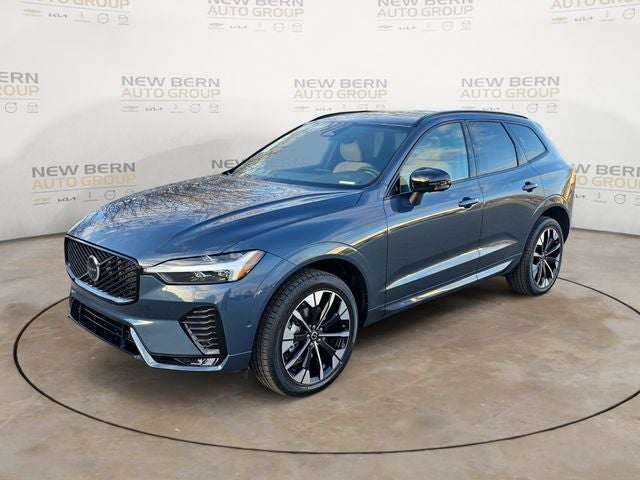2026 Volvo XC60 B5 Plus in Denim Blue Metallic — front three-quarter view